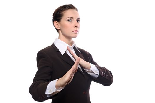 Karate business woman in defence pose isolating on white background