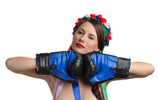 Girl with boxing gloves and floral wreath on her head. Isolated on white background