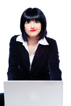 business woman behind laptop marveling, isolate on white