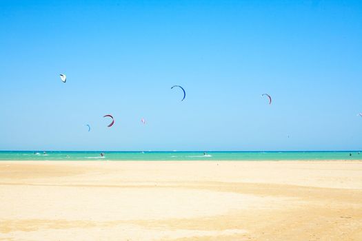 water sport on beach in Africa, kiteboarding