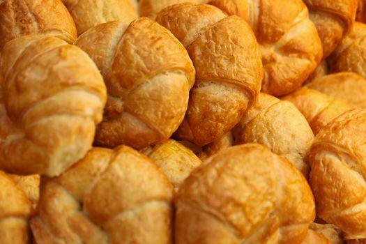 Croissants. Placed on a tray after baking - the background