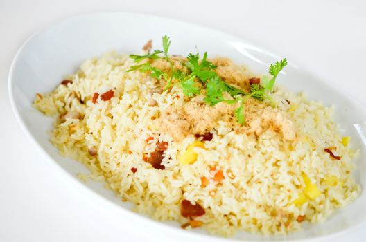  fired rice and  dried shredded pork  on white plate