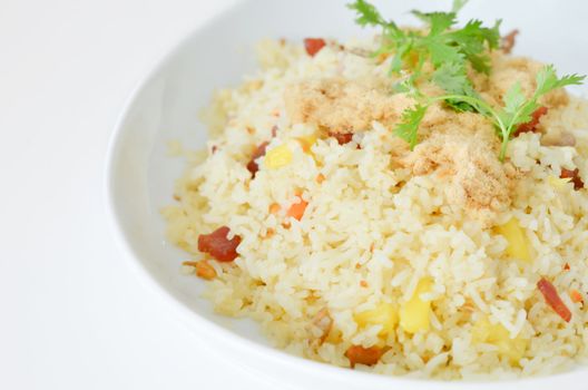  fired rice and  dried shredded pork  on white plate