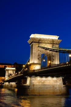 Night view of Chain bridge, Royal Palace and Danube river in Budapest