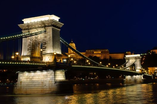 Night view of Chain bridge, Royal Palace and Danube river in Budapest