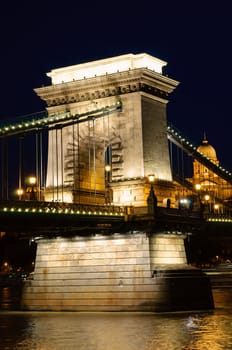 Night view of Chain bridge, Royal Palace and Danube river in Budapest