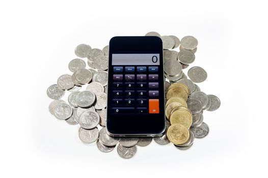 Mobile phone with coins on white background