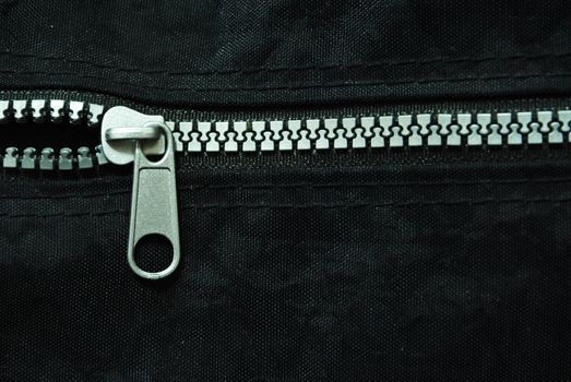 Zipper on black background.