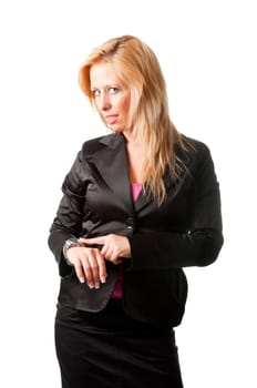 Businesswoman looking at her watch with a surprised look. Isolated on a white background.