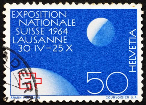 SWITZERLAND - CIRCA 1963: a stamp printed in the Switzerland shows EXPO Emblem on Globe and Moon, Swiss National Exhibition, Lausanne, Switzerland, circa 1963