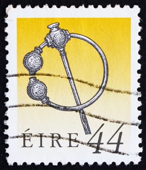 IRELAND - CIRCA 1991: a stamp printed in the Ireland shows Silver Thistle Brooch, Art Treasure of Ireland, circa 1991