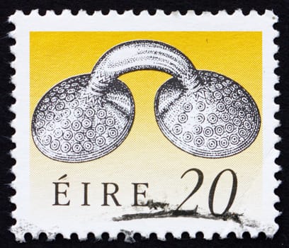 IRELAND - CIRCA 1991: a stamp printed in the Ireland shows Gold Dress Fastener, Art Treasure of Ireland, circa 1991
