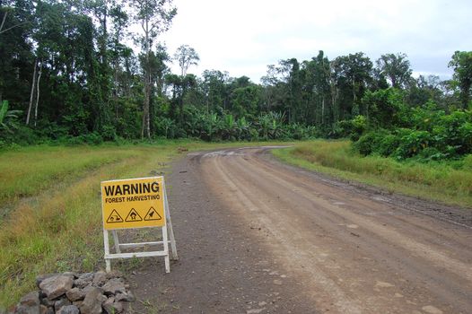 Road sign on haulage road  in outback of Papua New Guinea