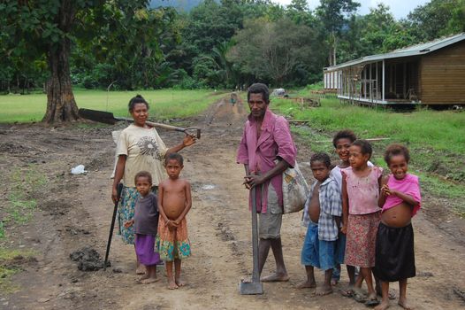 Family in village, outback of Papua New Guinea