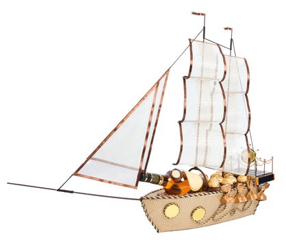 gift in form layout sailing ship decorated with candy isolated on white