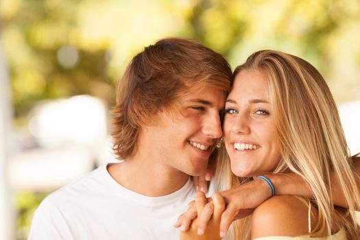 young beautiful couple enjoying a day on the park on summer