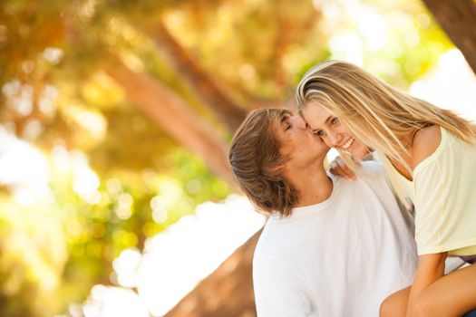 young beautiful couple enjoying a day on the park on summer