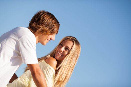 young beautiful couple enjoying a summer day together