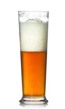 beer glass full of cold lager. Isolated.