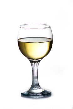 Wineglass with cold white wine. Isolated.
