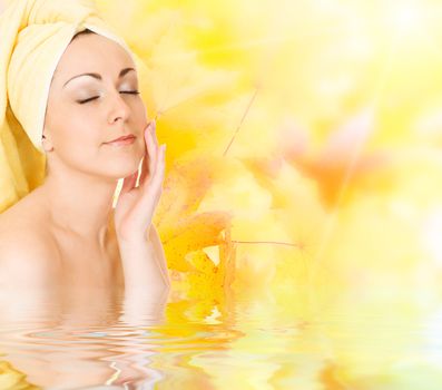 Young woman getting ready for the spa treatment on autumn background