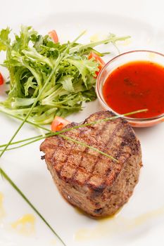 Grilled steak with sauce