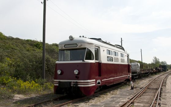 old tram in Holland riding near ouddorp