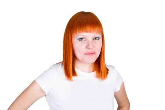 Portrait of a beautiful young redheaded woman looking happy against white background