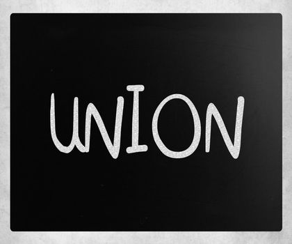 The word "Union" handwritten with white chalk on a blackboard