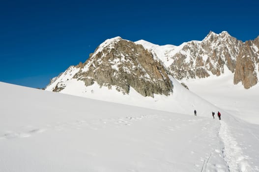 mountaineers on a Italian glacier (Mont Blanc Massif, Italian Alps)
