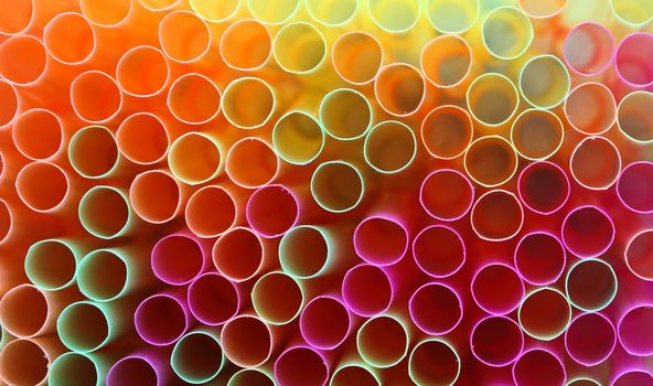 Close up picture of many colorful straws
