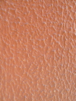 closeup of textured brown paint surface