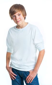 Portrait of young smiling cute teenager in white, isolated on white