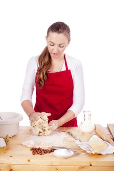 beautiful woman is baking cookies for christmas isolated