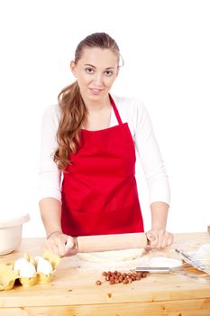 beautiful woman is baking cookies for christmas isolated