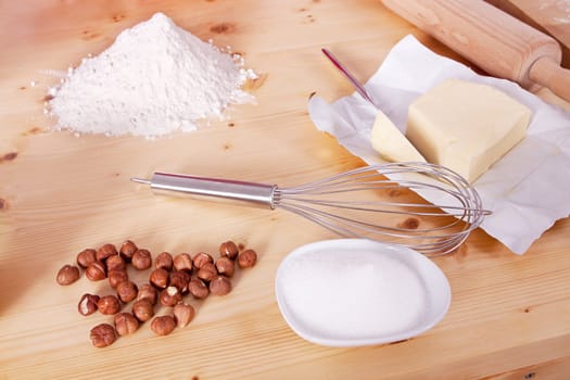 different ingredients for baking on wooden table