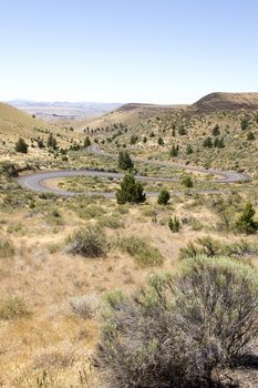 Long Winding Highway Along High Desert in Central Oregon