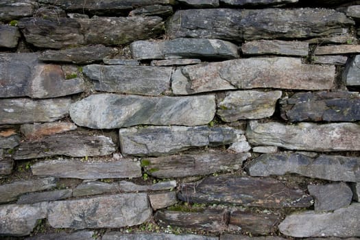 Picture of a stone wall from an old house