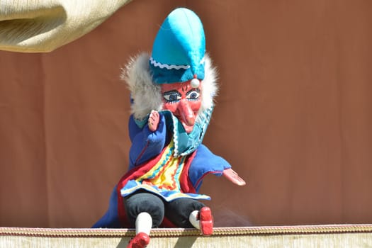 mr punch sitting