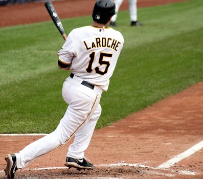 PITTSBURGH - SEPTEMBER 24 : Andy LaRoche of the Pittsburgh Pirates swings at a pitch against Cincinnati Reds on September 24, 2009 in Pittsburgh, PA.