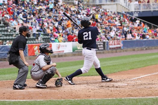 SCRANTON, PA - MAY 24: Scranton Wilkes Barre Yankees batter Jesus Montero swings in a game against the Indianapolis Indians at PNC Field on May 24, 2011 in Scranton, PA.