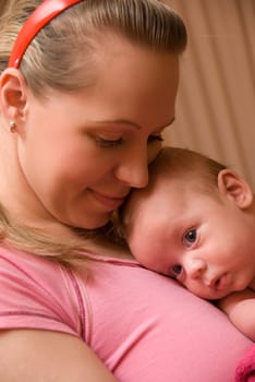 Happy maternity: mother with her baby boy 