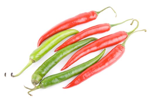 red and green hot chili peppers isolated on white