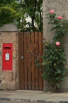 British Cottage with a post box, Scotland, United Kingdom