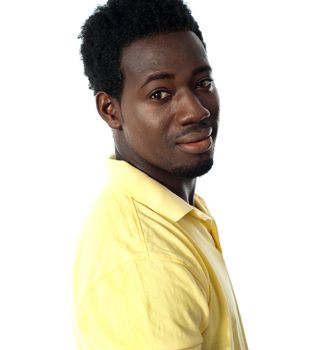 Young african guy posing in casuals isolated over white background