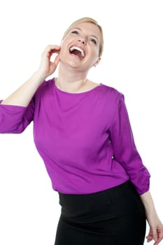 Happy young businesswoman enjoying herself isolated against white background