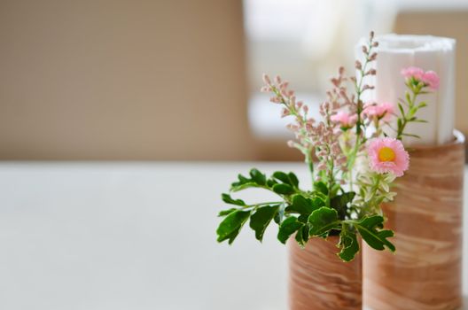 set up flowers at  table in restaurant