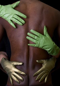 Two girl hands embrace black man at gloves on white
