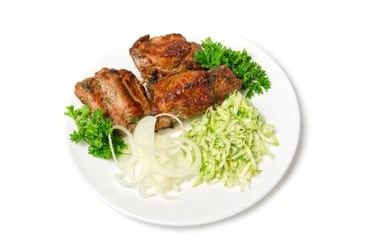 Grilled meat with sauce and vegetables isolated on white background