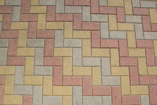different colors brick pavement footpath background